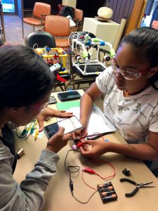 2 PCC students build circuits as part of a ROV building activity
