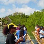 PCC marine science students on traditional canoes 
